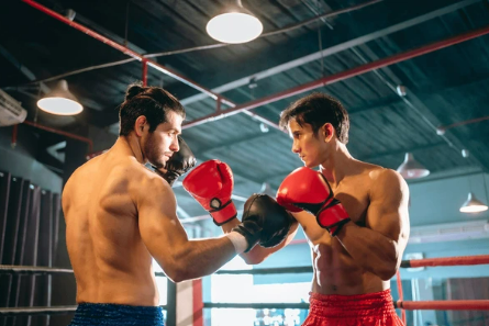 taille de ses gants de boxe